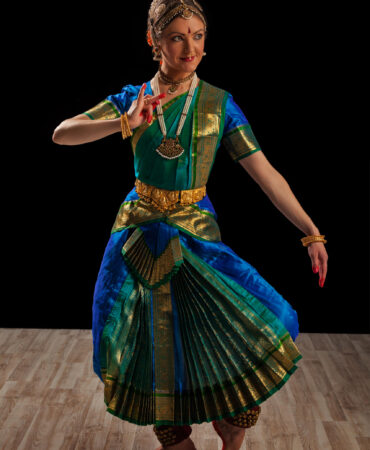 Young beautiful woman dancer exponent of Indian classical dance Bharatanatyam