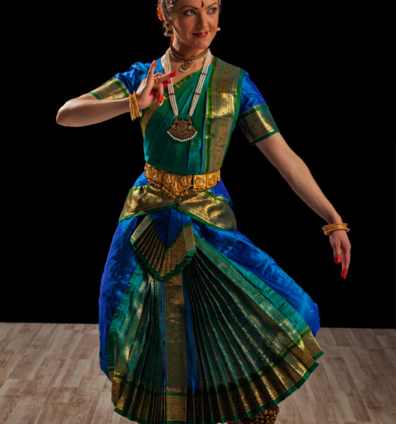 Young beautiful woman dancer exponent of Indian classical dance Bharatanatyam