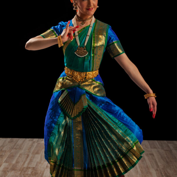 Young beautiful woman dancer exponent of Indian classical dance Bharatanatyam