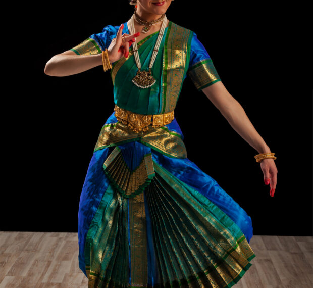 Young beautiful woman dancer exponent of Indian classical dance Bharatanatyam